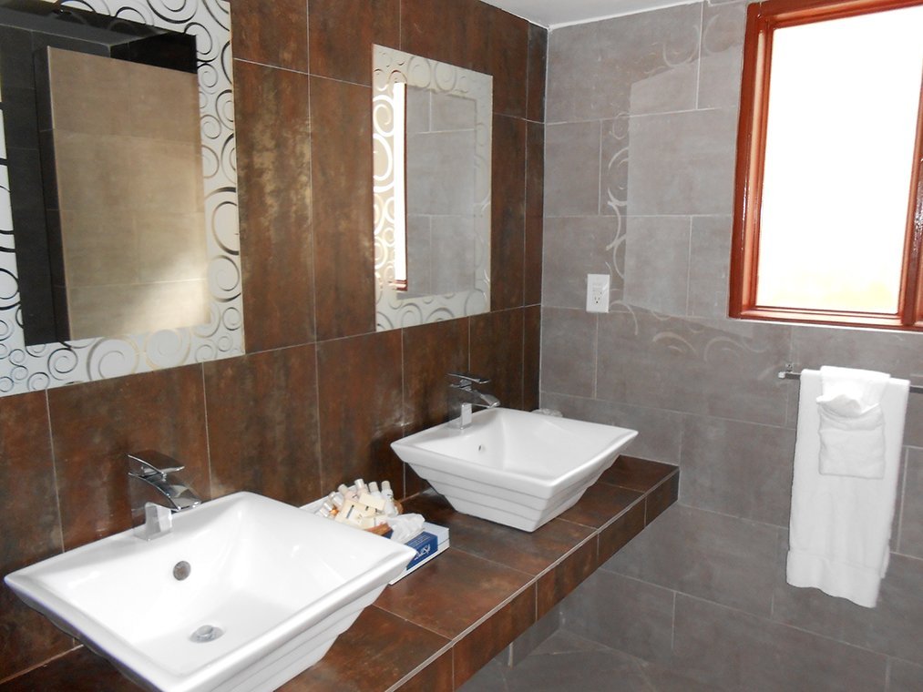 Old Gin House - Badkamer van Garden view kamers